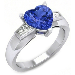 Anello a forma di cuore con 3 diamanti baguette e zaffiro blu 2.75 carati