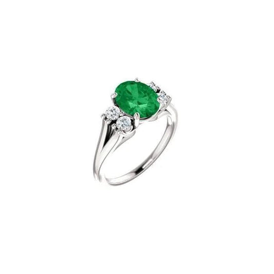 Anello anniversario 7.40 carati con Verde smeraldo e diamanti. oro bianco 14 carati