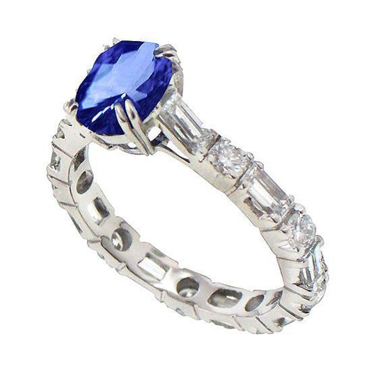Anello anniversario in oro con zaffiro blu dello Sri Lanka ovale da 3.76 ct. - harrychadent.it