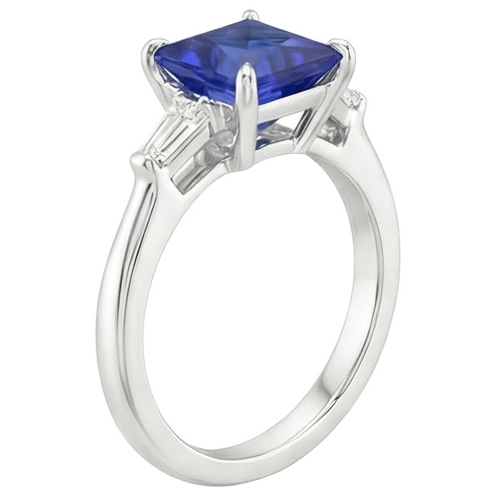 Anello con 3 pietre di diamanti. zaffiro blu principessa e baguette 5.50 carati