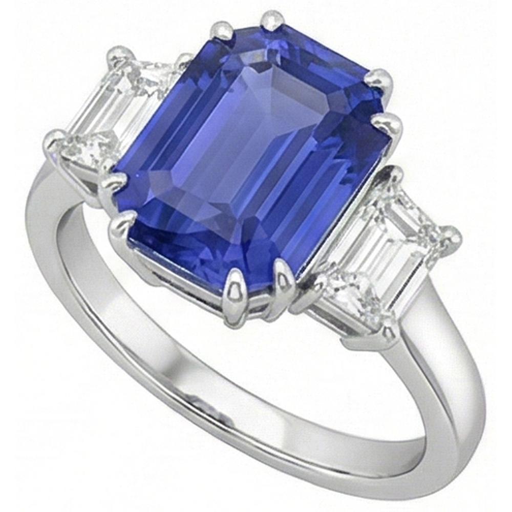 Anello con 3 pietre di smeraldo e diamante trapezoidale con zaffiro di Ceylon 3 carati