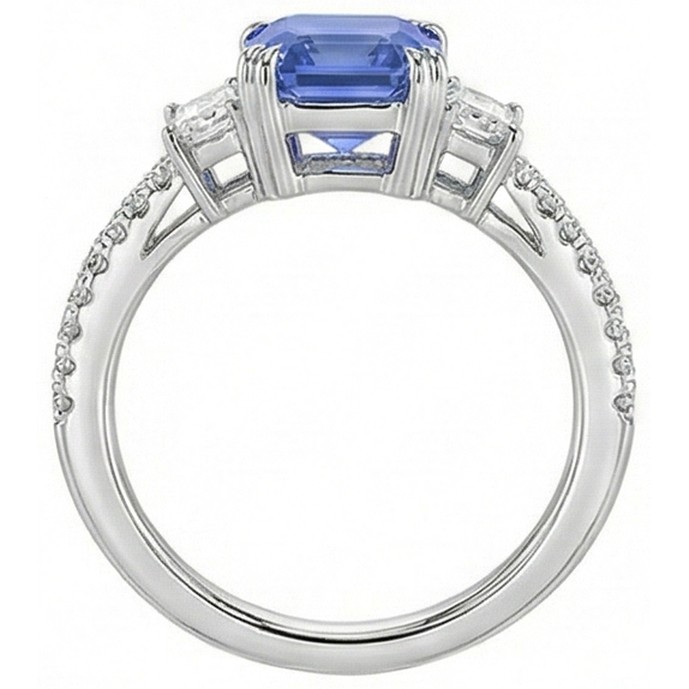 Anello con 3 pietre di smeraldo e zaffiro di Srilanka e pavé di diamanti 3.50 carati