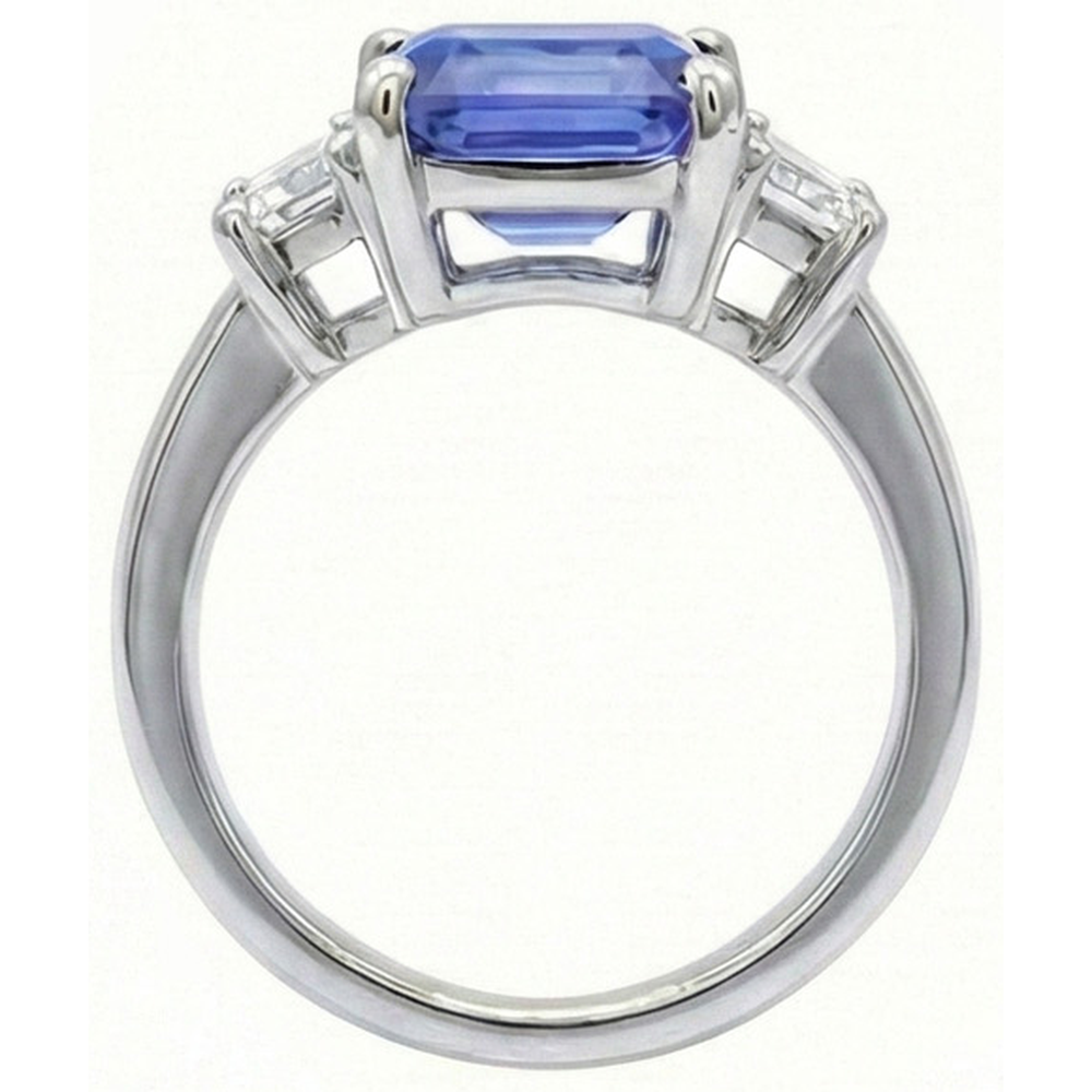 Anello con 3 pietre di zaffiro azzurro taglio smeraldo 2 carati in oro bianco
