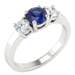Anello con 3 pietre di zaffiro blu e diamante. 1.50 carati. set di cestini in oro a 4 punte