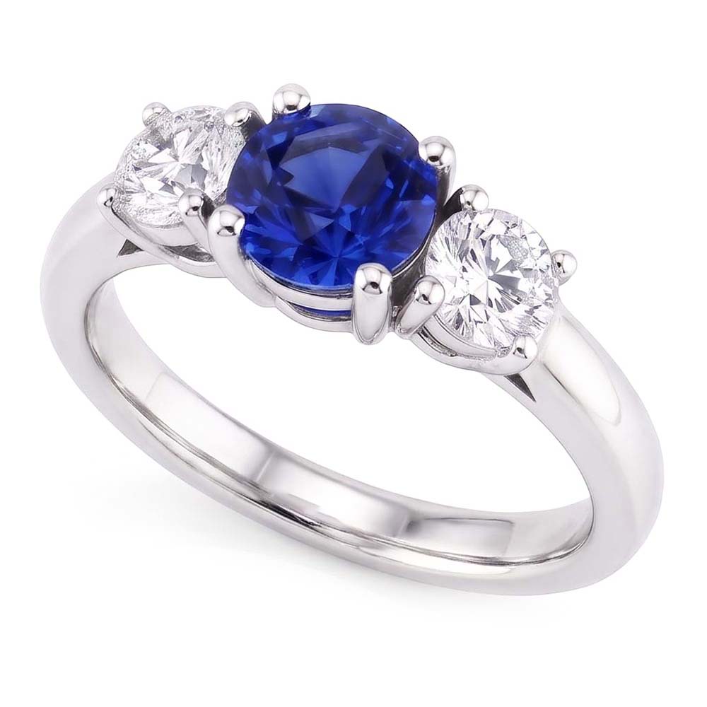 Anello con 3 pietre preziose. zaffiro rotondo dello Sri Lanka. diamante da 2.50 carati