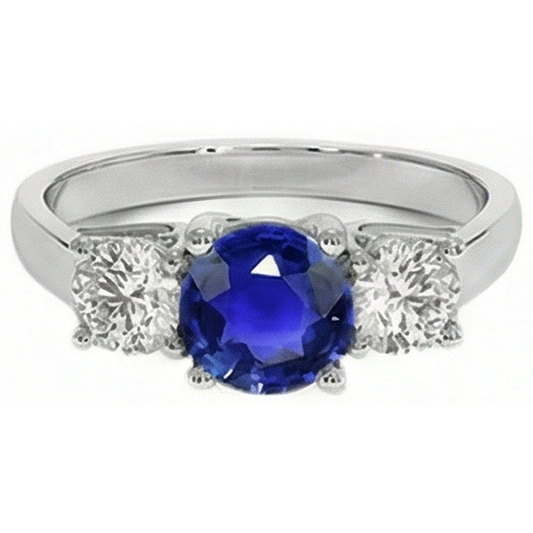 Anello con 3 pietre rotonde con zaffiri blu e diamanti. 4 carati. incastonati in oro 14K