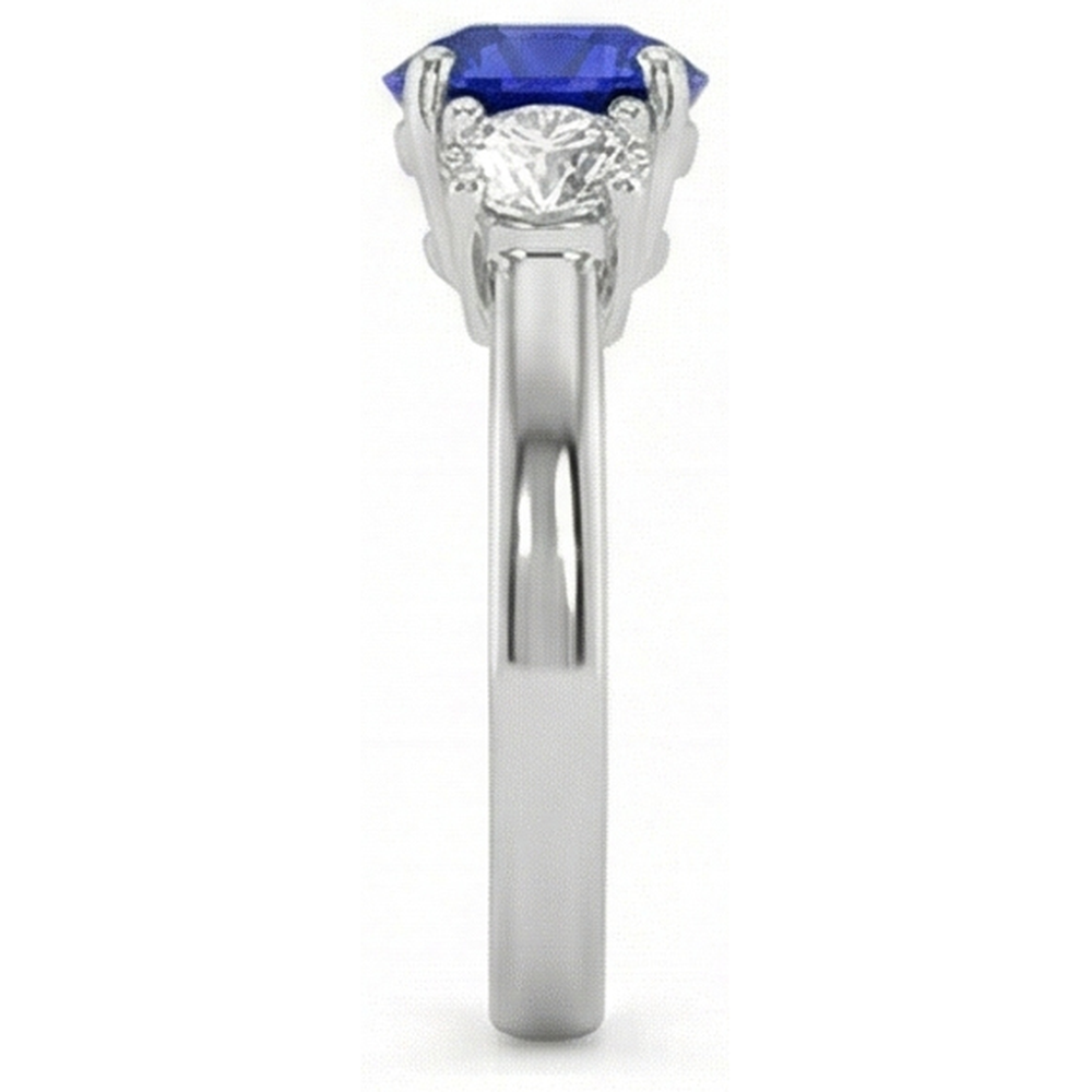 Anello con 3 pietre rotonde con zaffiri blu e diamanti. 4 carati. incastonati in oro 14K