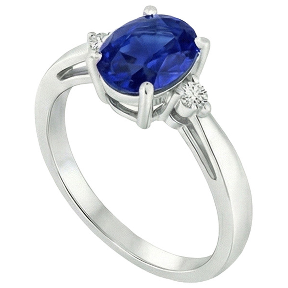 Anello con 3 pietre. zaffiro blu ovale e diamante. gambo affusolato da 4.75 carati