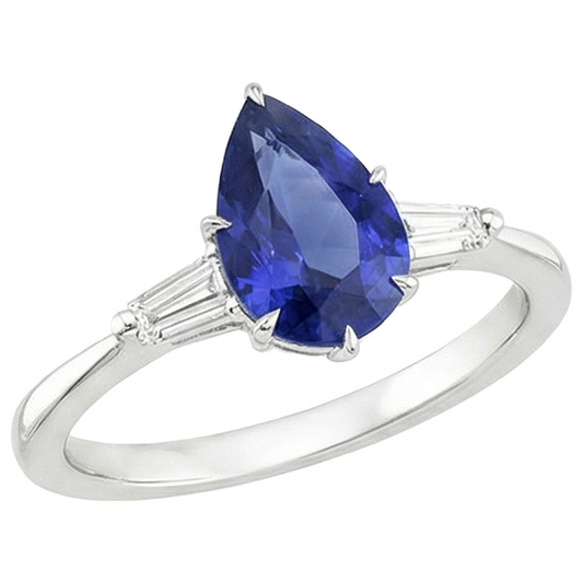 Anello con Zaffiro Blu Pera 3 Carati e Diamanti Baguette Tre Pietre in oro bianco 14 carati