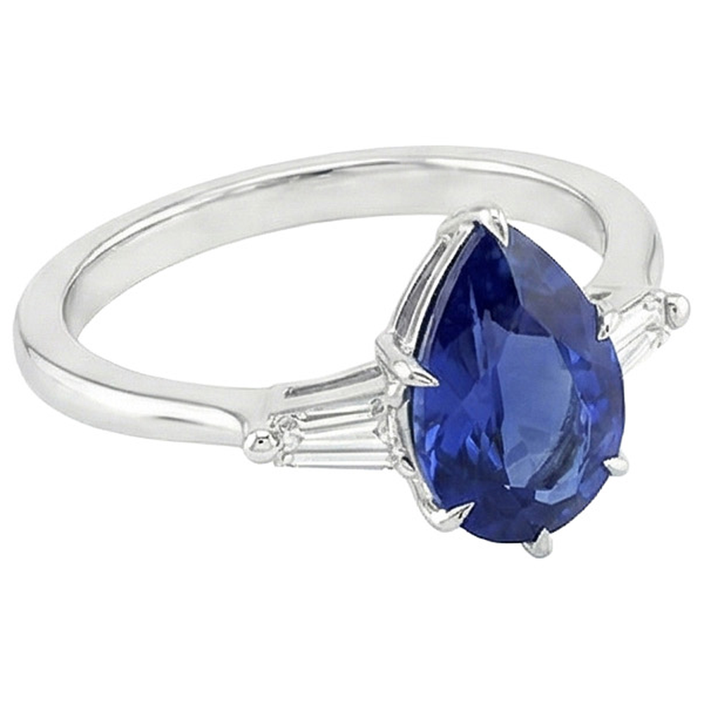 Anello con Zaffiro Blu Pera 3 Carati e Diamanti Baguette Tre Pietre in oro bianco 14 carati