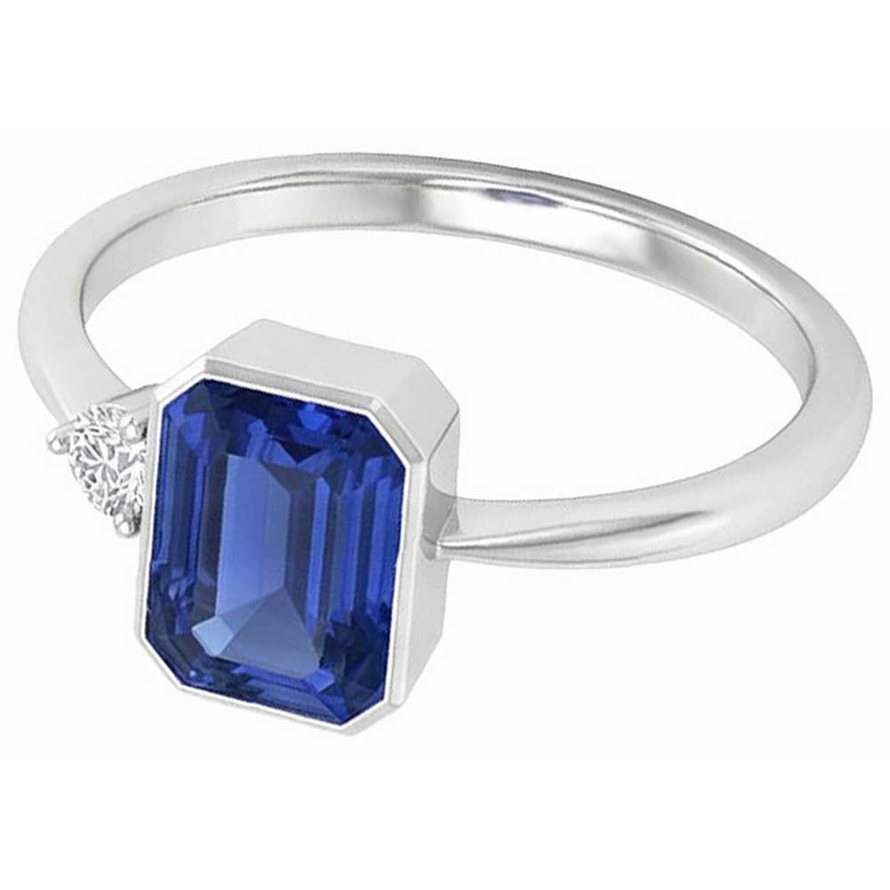 Anello con castone con diamanti rotondi incastonato con zaffiro blu. gambo affusolato da 1.75 carati