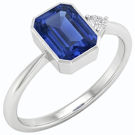Anello con castone con diamanti rotondi incastonato con zaffiro blu. gambo affusolato da 1.75 carati