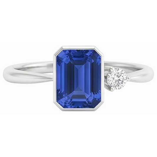 Anello con castone con diamanti rotondi incastonato con zaffiro blu. gambo affusolato da 1.75 carati