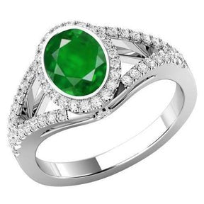 Anello con castone in oro bianco con Verde smeraldo e diamanti da 4.25 ct