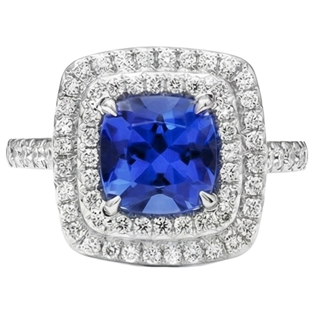 Anello con cuscino Halo da 15 ct. Tanzanite e diamanti in oro bianco 14K