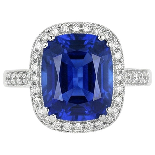 Anello con cuscino in zaffiro blu e diamanti a taglio rotondo da 4,55 carati WG 14K