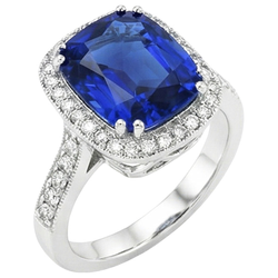Anello con cuscino in zaffiro blu e diamanti a taglio rotondo da 4,55 carati WG 14K