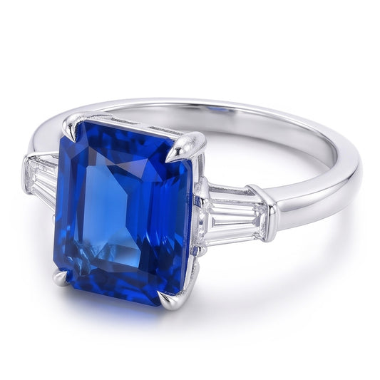 Anello con diamante artigli d'aquila incastonato con zaffiro blu radiante oro 7 carati 14K