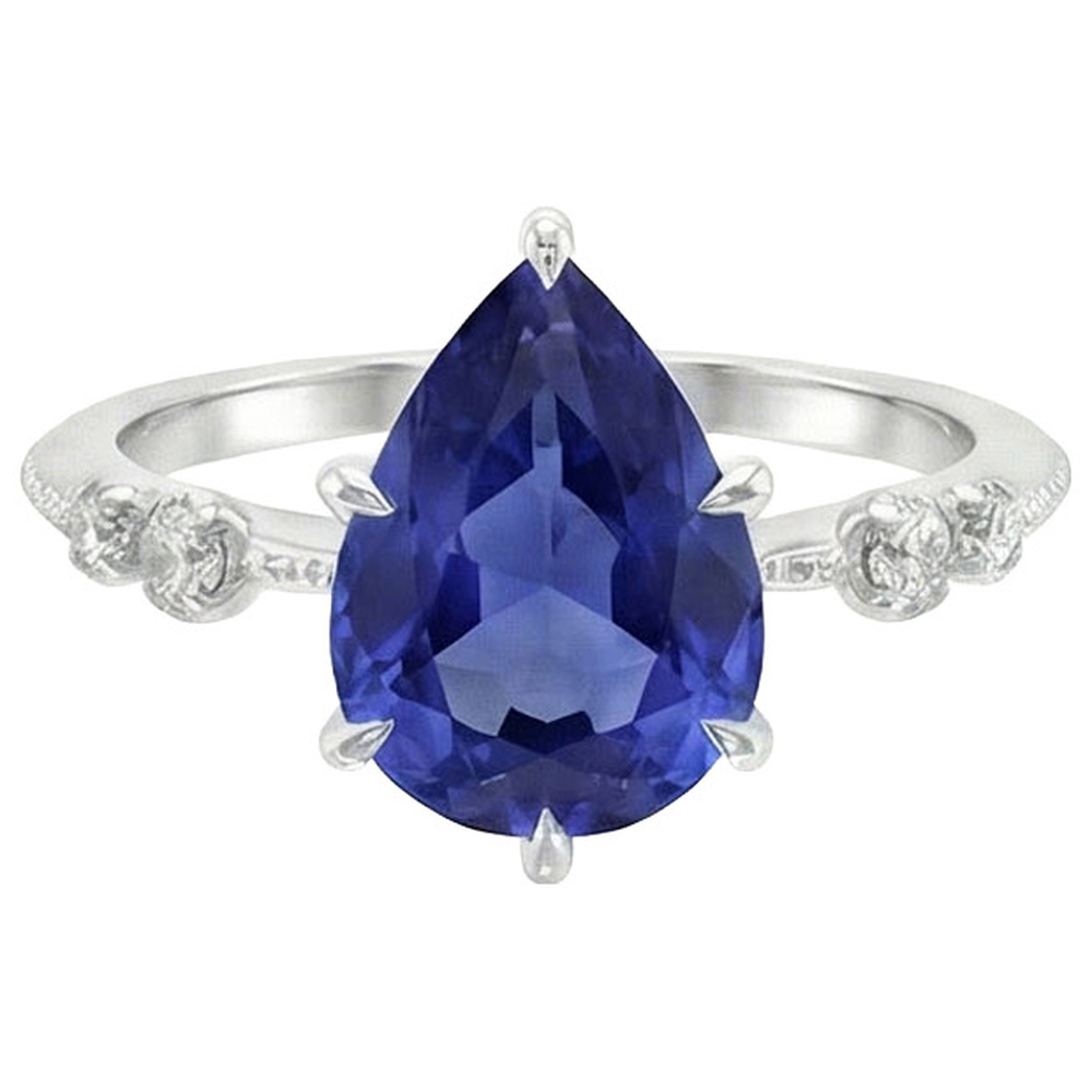 Anello con diamante. pera. zaffiro di Ceylon. 5 pietre. 2.50 carati