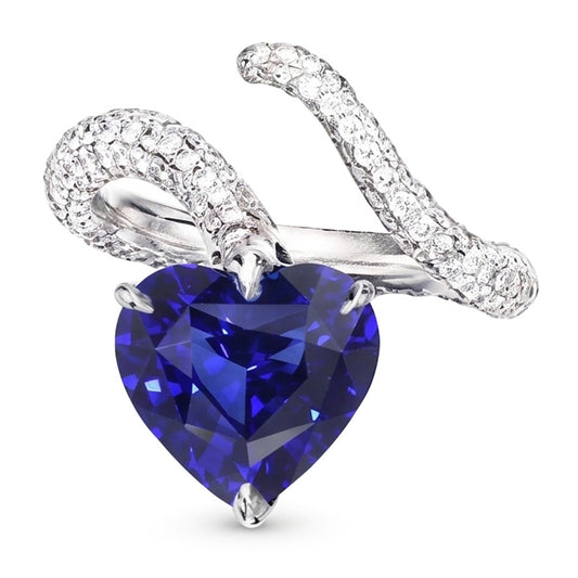 Anello con diamanti a forma di cuore con zaffiro blu. stile intrecciato. 5 carati