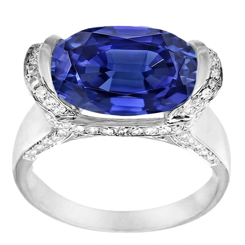 Anello con diamanti tondi e zaffiri blu taglio ovale con montatura a barra 4.50 carati