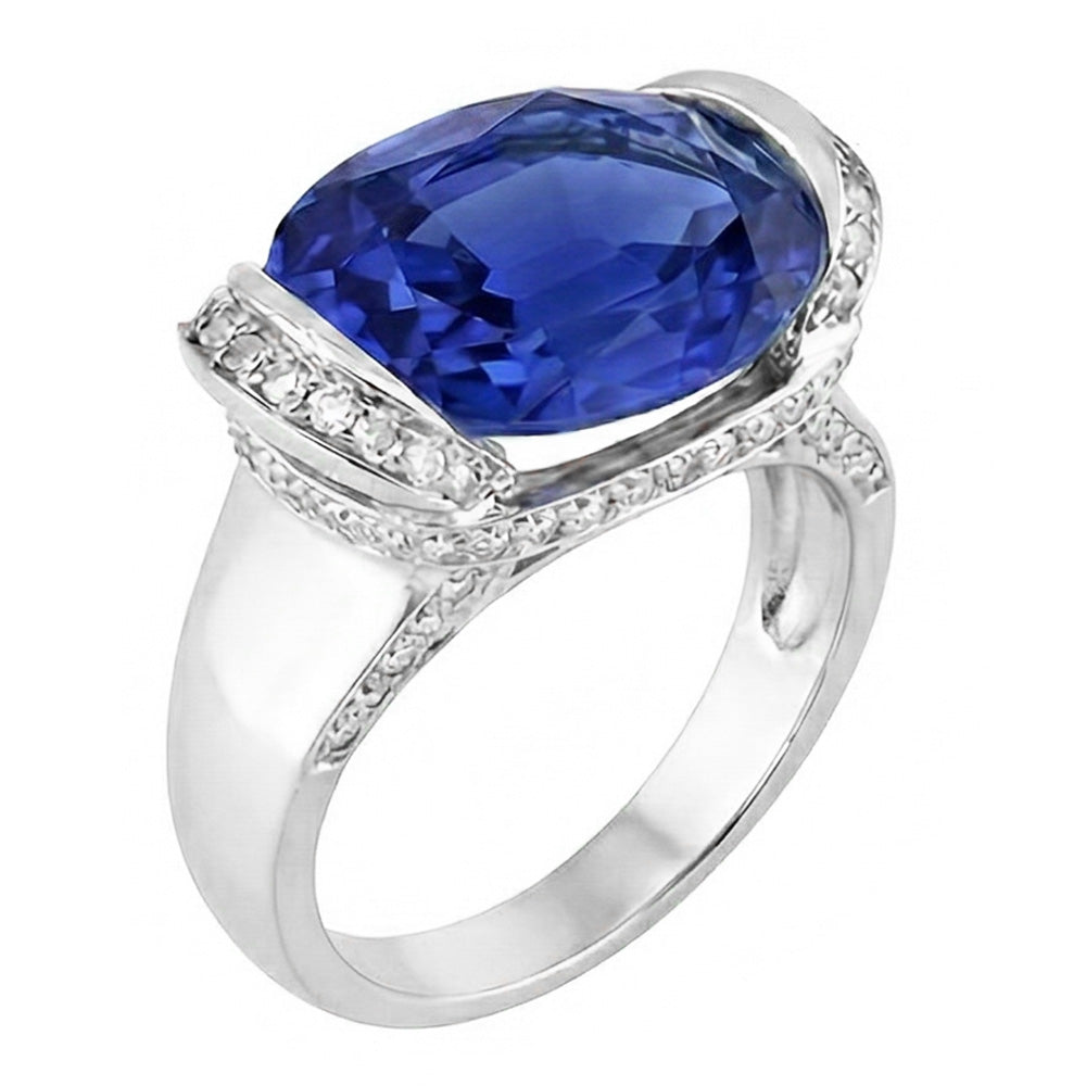 Anello con diamanti tondi e zaffiri blu taglio ovale con montatura a barra 4.50 carati