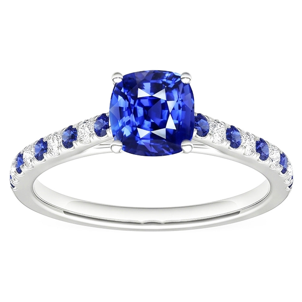 Anello con gemme a cuscino. zaffiro blu rotondo e diamanti 2.50 carati