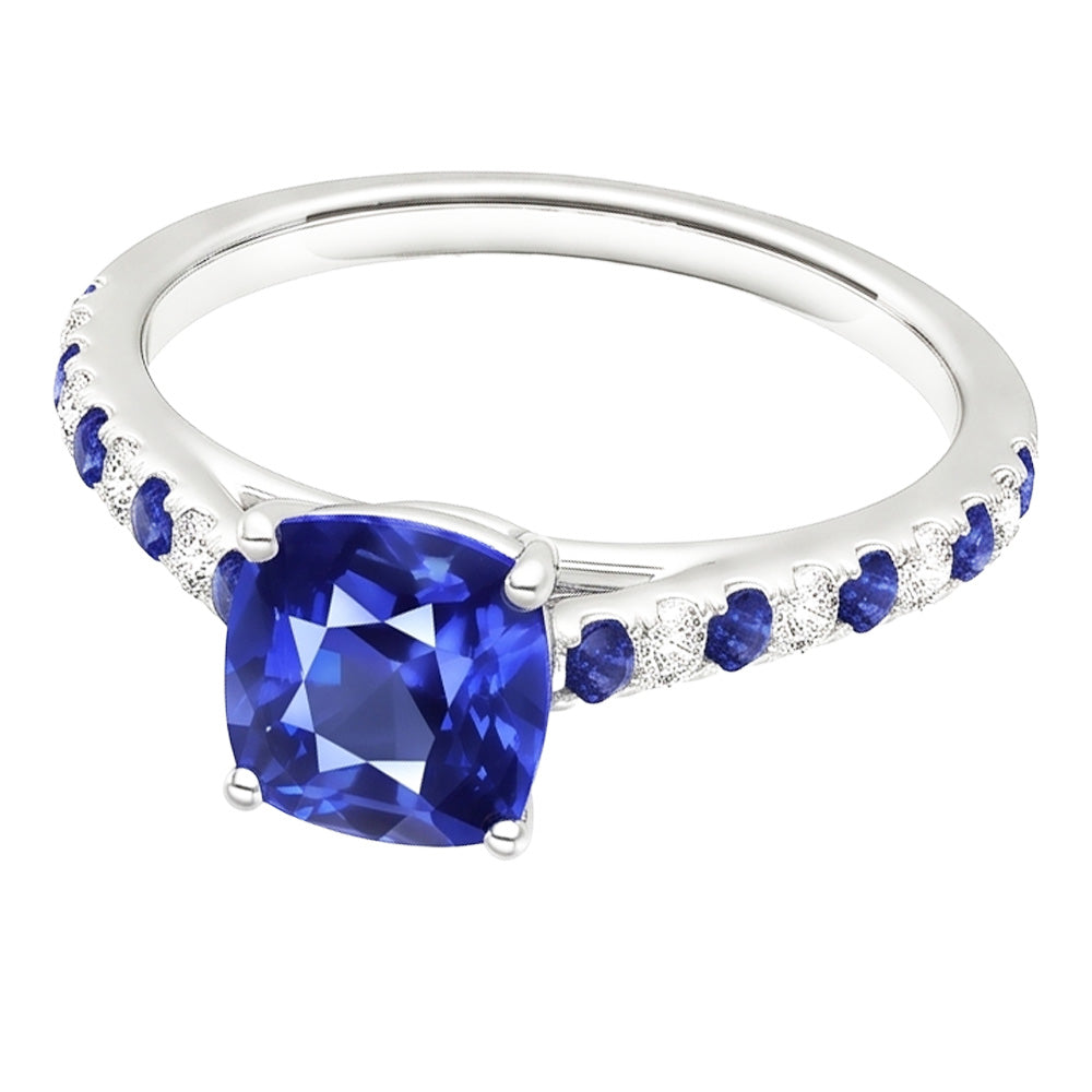 Anello con gemme a cuscino. zaffiro blu rotondo e diamanti 2.50 carati