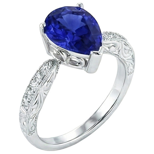 Anello con pietre preziose in filigrana con stelo in zaffiro di Ceylon a 2 carati e diamanti in oro bianco 14K