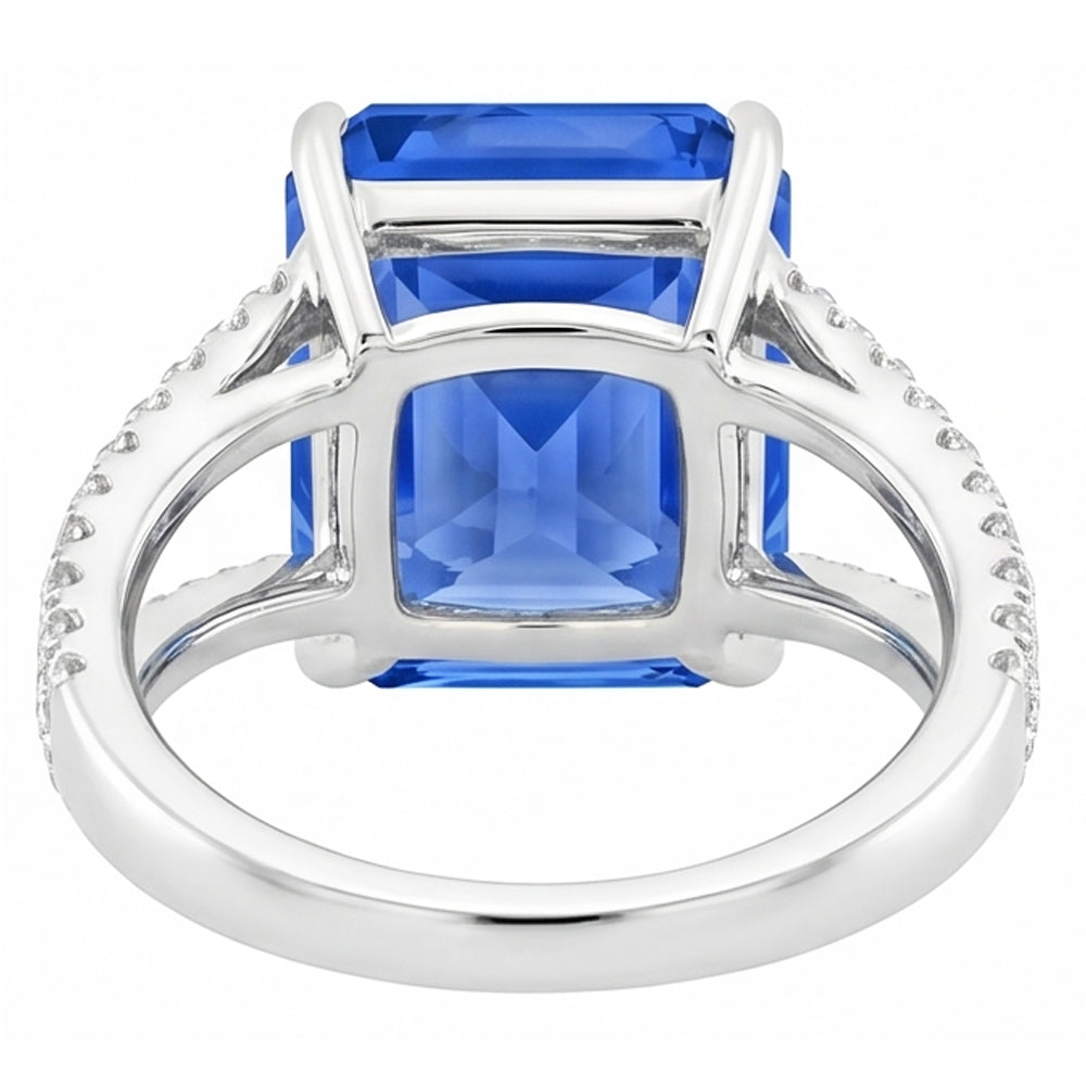 Anello con pietre preziose. zaffiro blu radiante con gambo diviso. diamante rotondo 5 carati