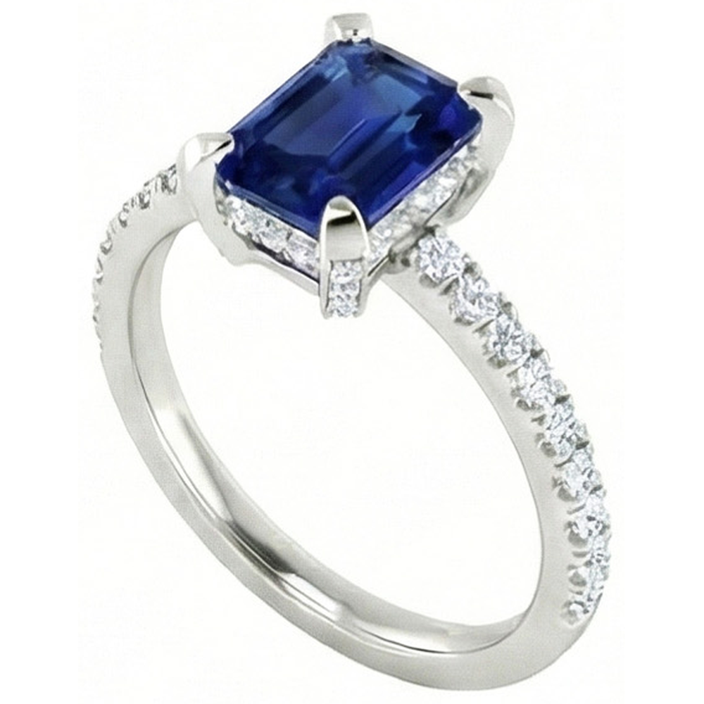 Anello con smeraldo 3 carati incastonato e zaffiro di Ceylon tondo con diamanti in oro bianco 14K