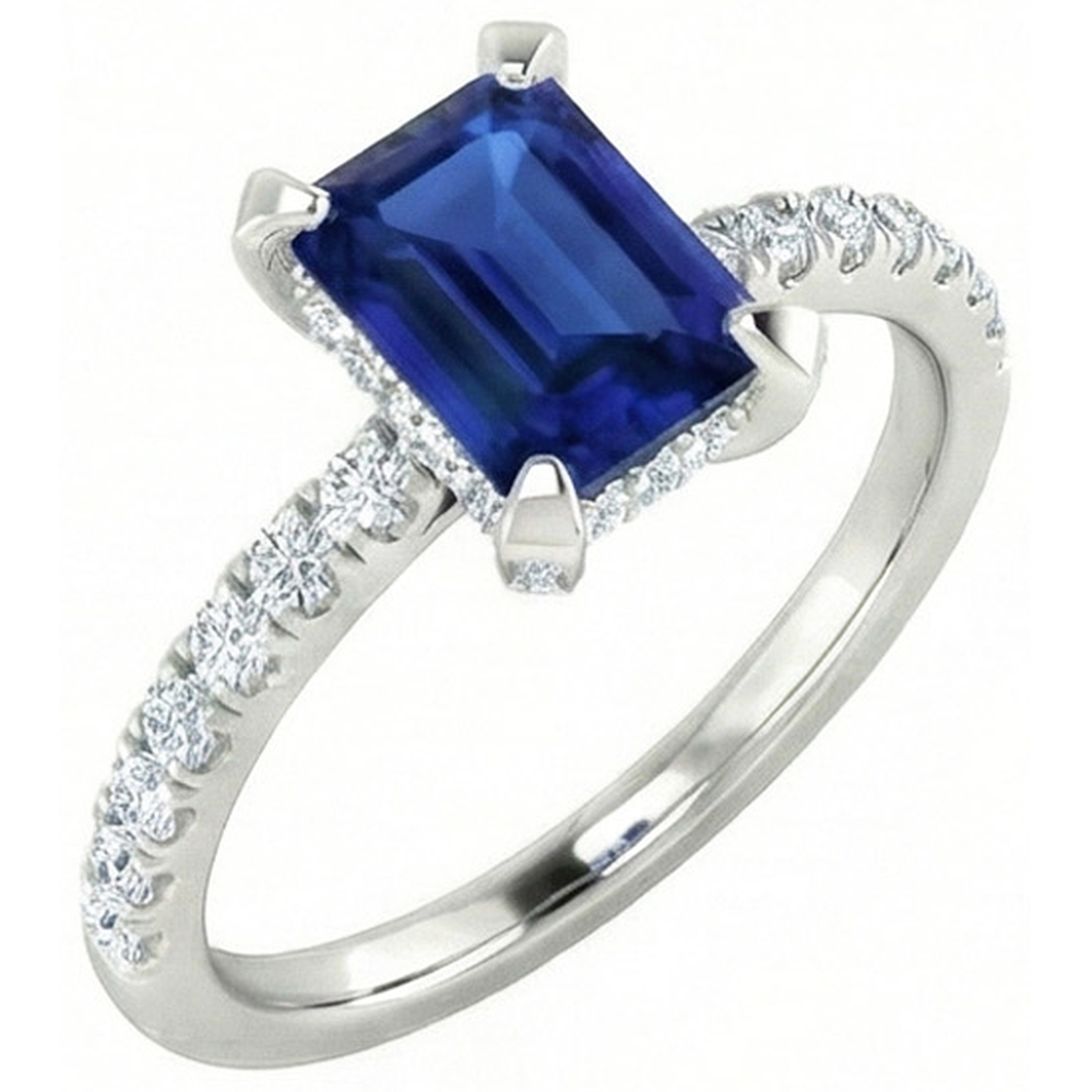 Anello con smeraldo 3 carati incastonato e zaffiro di Ceylon tondo con diamanti in oro bianco 14K