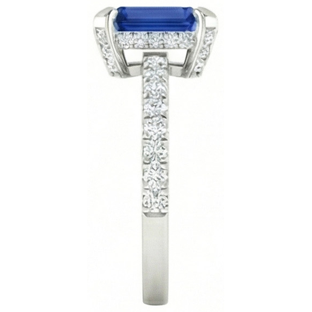 Anello con smeraldo 3 carati incastonato e zaffiro di Ceylon tondo con diamanti in oro bianco 14K