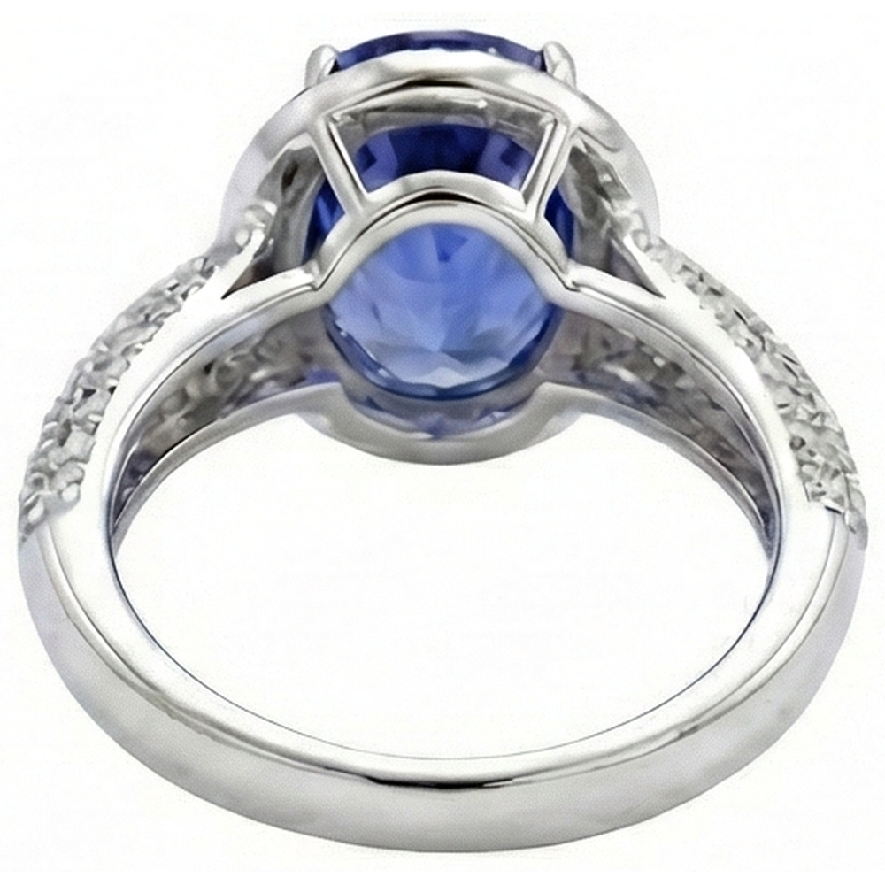 Anello con tanzanite ovale e diamanti 7 carati pavé d'oro bianco 14K