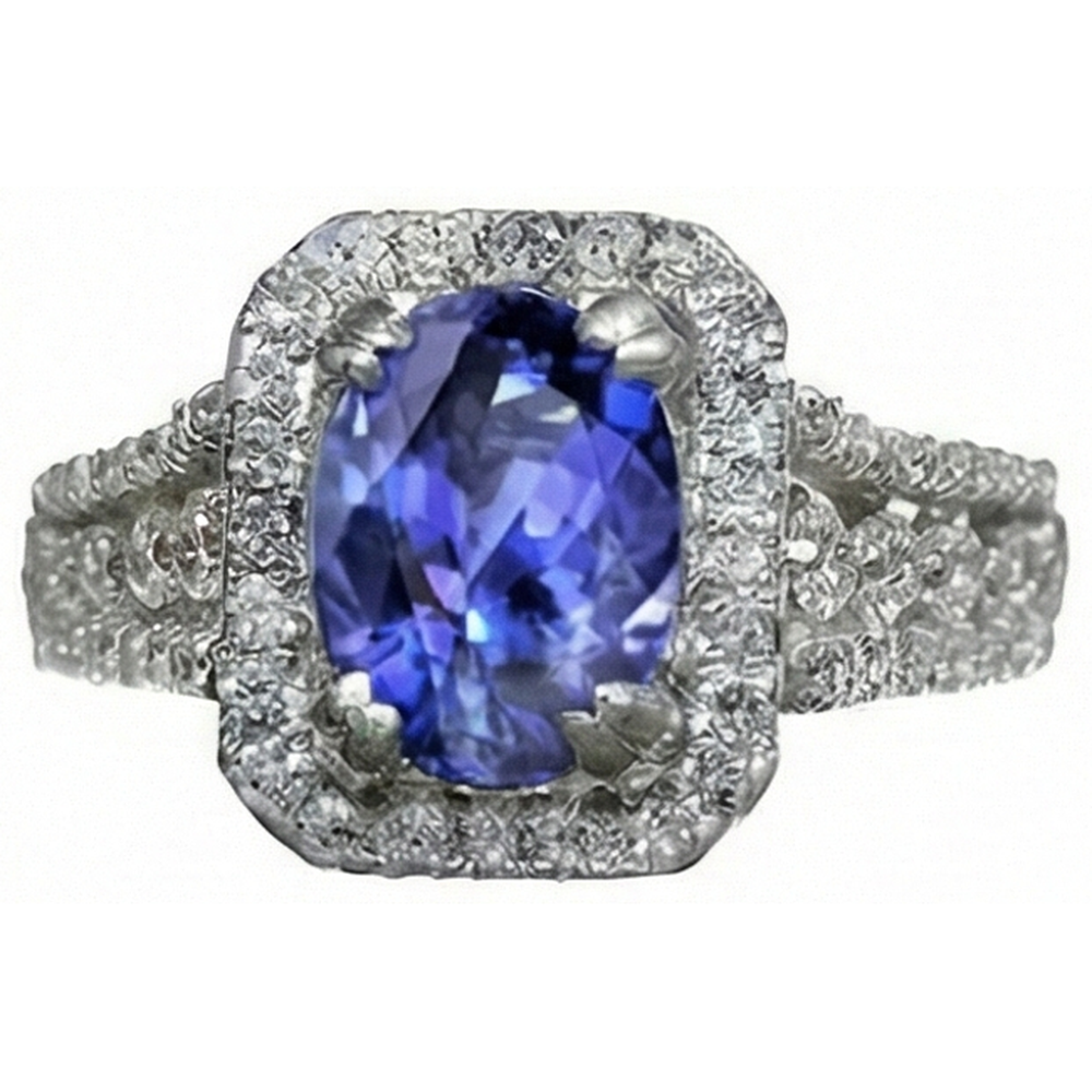 Anello con tanzanite ovale e pavé di diamanti 5.70 carati WG 14K