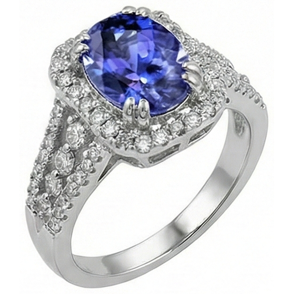 Anello con tanzanite ovale e pavé di diamanti 5.70 carati WG 14K