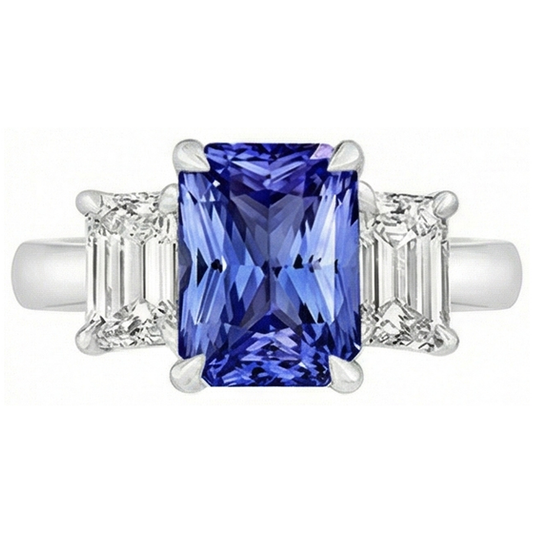 Anello con tre pietre di smeraldo. diamante e zaffiro di Ceylon. 3 carati a griffe