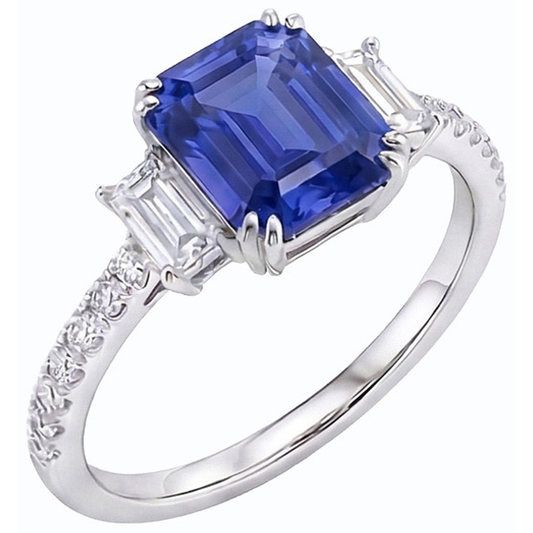 Anello con tre pietre di smeraldo e zaffiro blu e pavé di diamanti 3 carati