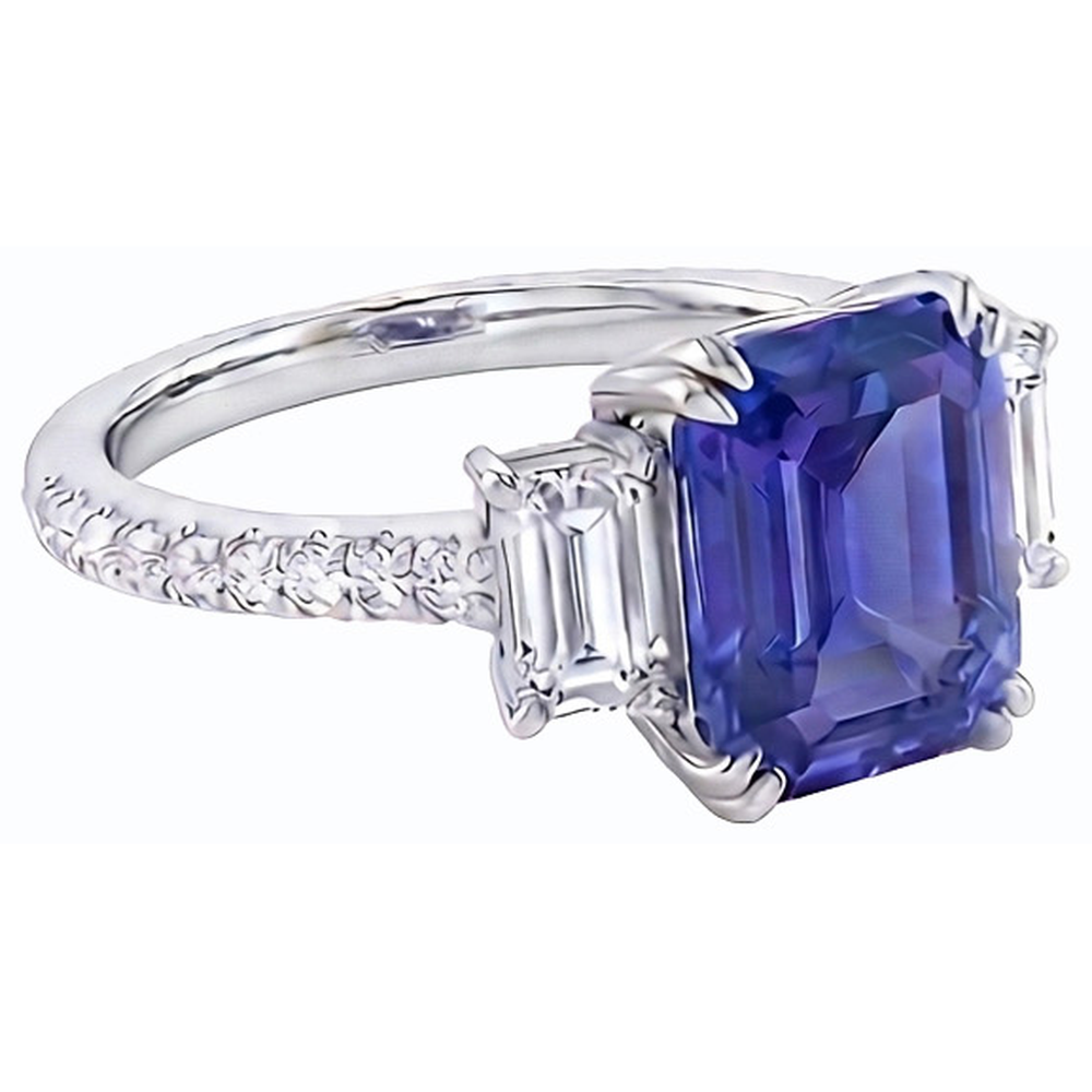 Anello con tre pietre di smeraldo e zaffiro blu e pavé di diamanti 3 carati