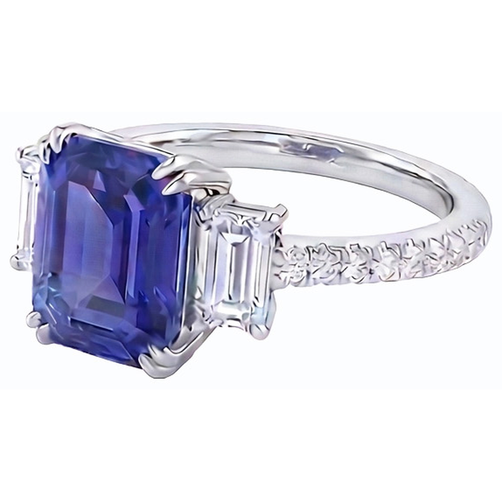 Anello con tre pietre di smeraldo e zaffiro blu e pavé di diamanti 3 carati