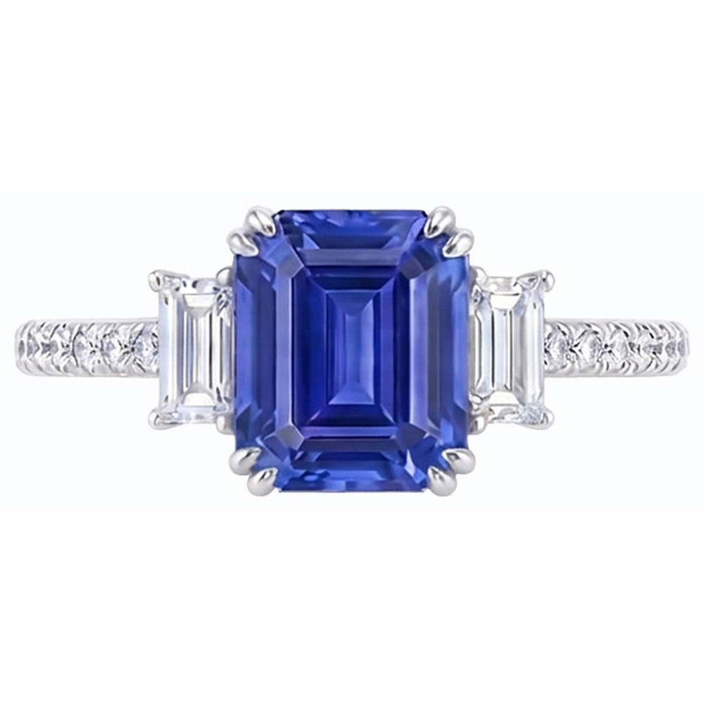 Anello con tre pietre di smeraldo e zaffiro blu e pavé di diamanti 3 carati