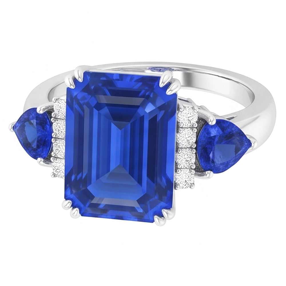Anello con tre pietre di smeraldo e zaffiro blu naturale e diamanti 3 carati
