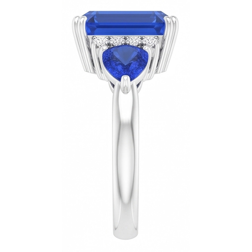 Anello con tre pietre di smeraldo e zaffiro blu naturale e diamanti 3 carati