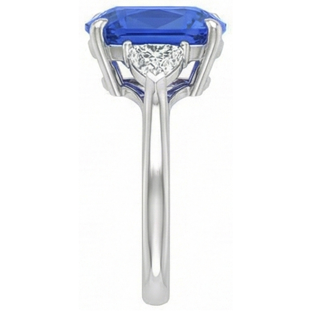 Anello con tre pietre di zaffiro blu ovale e trilioni di diamanti 4.50 carati