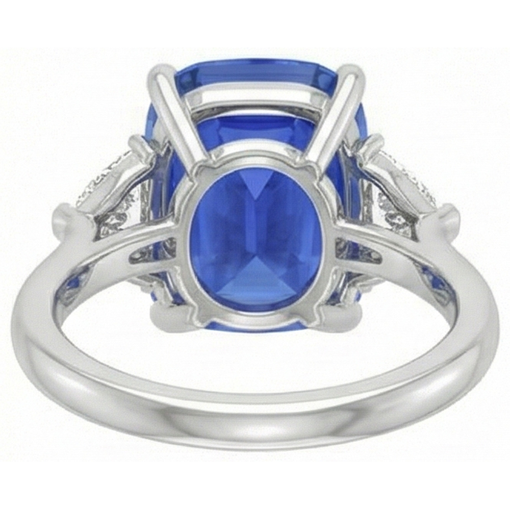 Anello con tre pietre di zaffiro blu ovale e trilioni di diamanti 4.50 carati