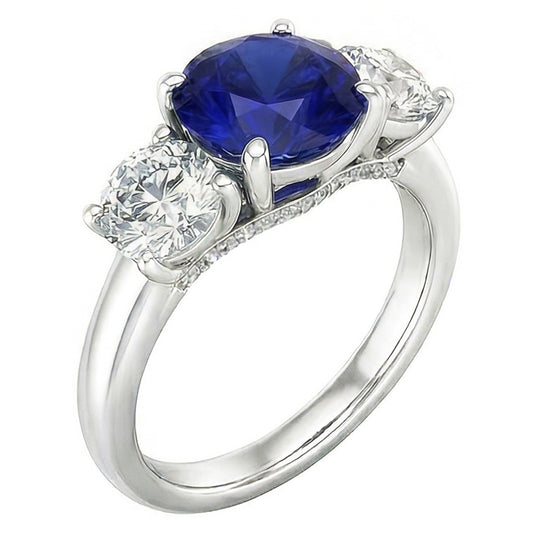 Anello con tre pietre di zaffiro blu rotondo e diamanti rotondi 2.50 carati