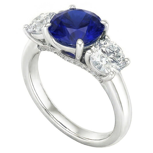 Anello con tre pietre di zaffiro blu rotondo e diamanti rotondi 2.50 carati