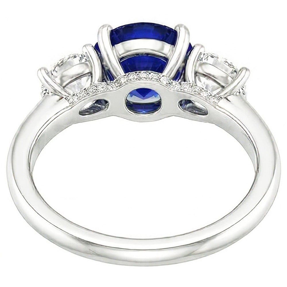 Anello con tre pietre di zaffiro blu rotondo e diamanti rotondi 2.50 carati