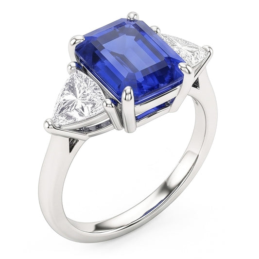 Anello con tre pietre di zaffiro blu. smeraldo e trilioni di diamanti 2.50 carati
