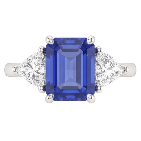 Anello con tre pietre di zaffiro blu. smeraldo e trilioni di diamanti 2.50 carati